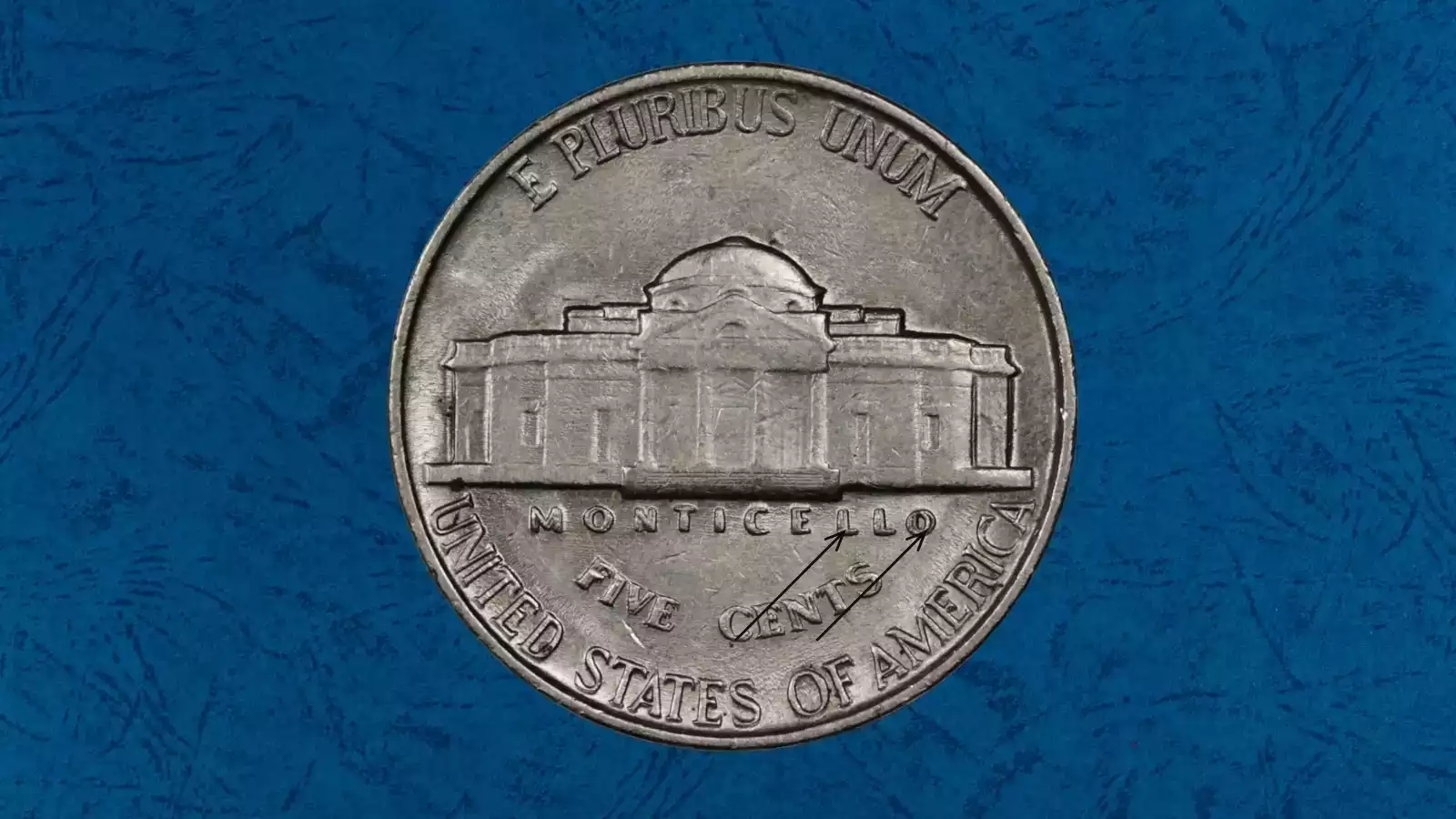 1965 Jefferson nickel Doubled Die Reverse WDDR-001 — doubling visible on E PLURIBUS UNUM motto